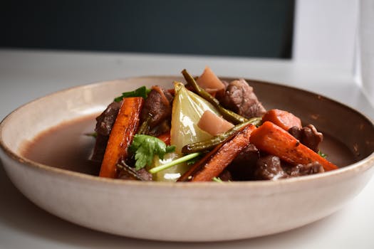 Savor this mouth-watering beef and vegetable stew featuring tender meat and vibrant root vegetables.